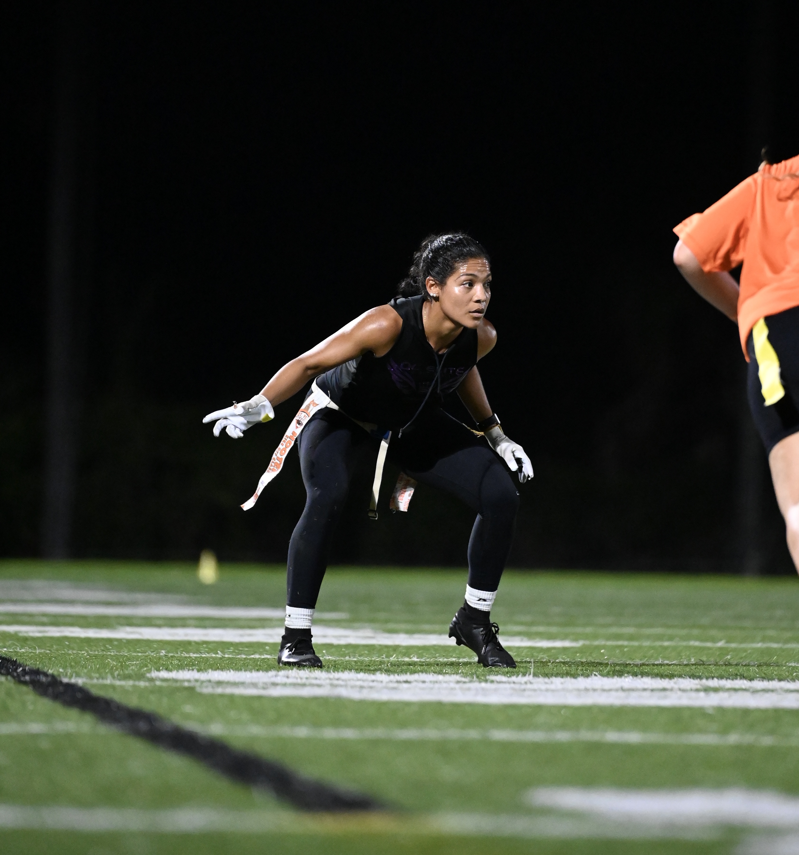 Coach Idalys Acosta in defensive coverage