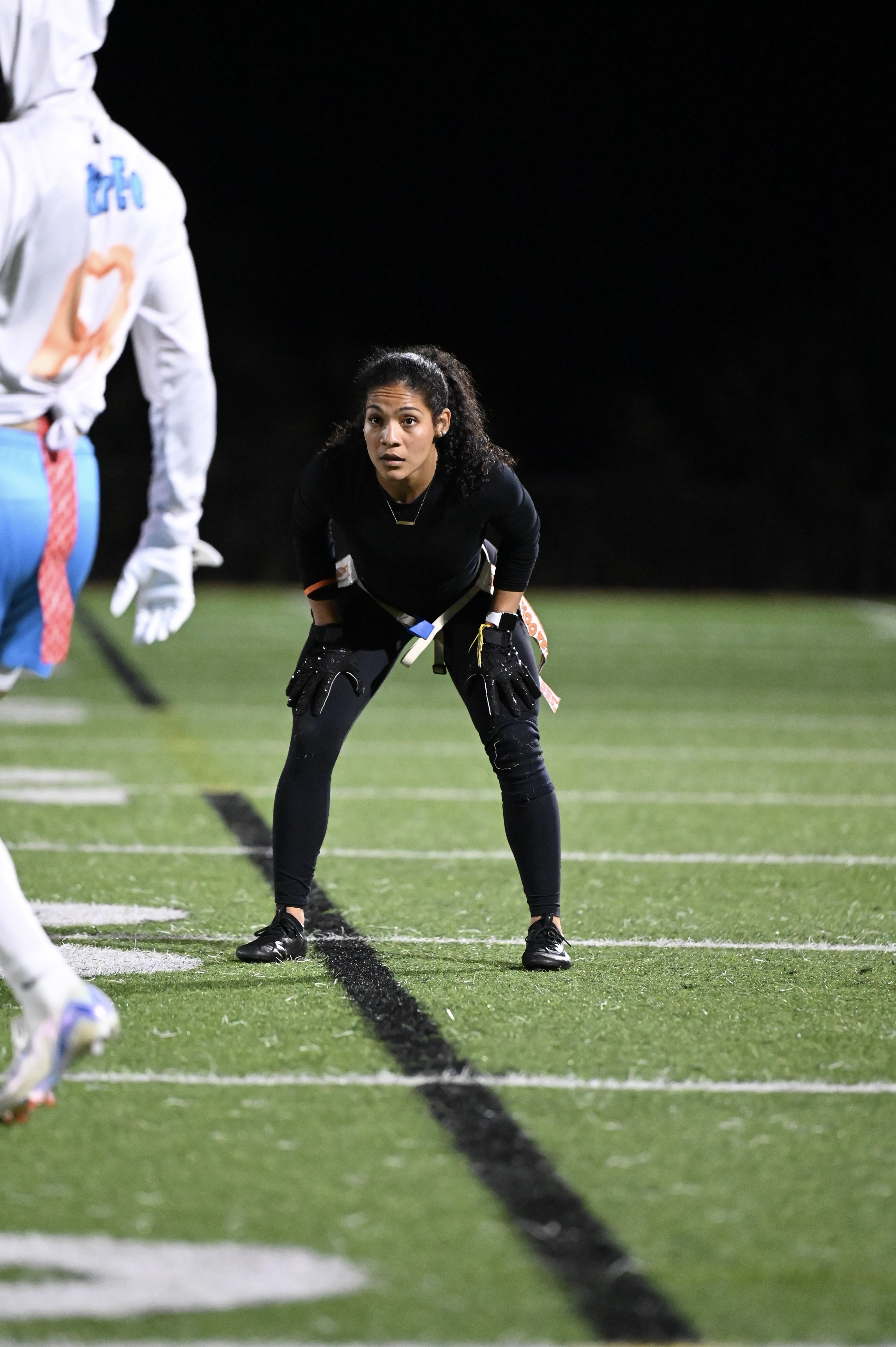 Coach Idalys Acosta competing in flag football